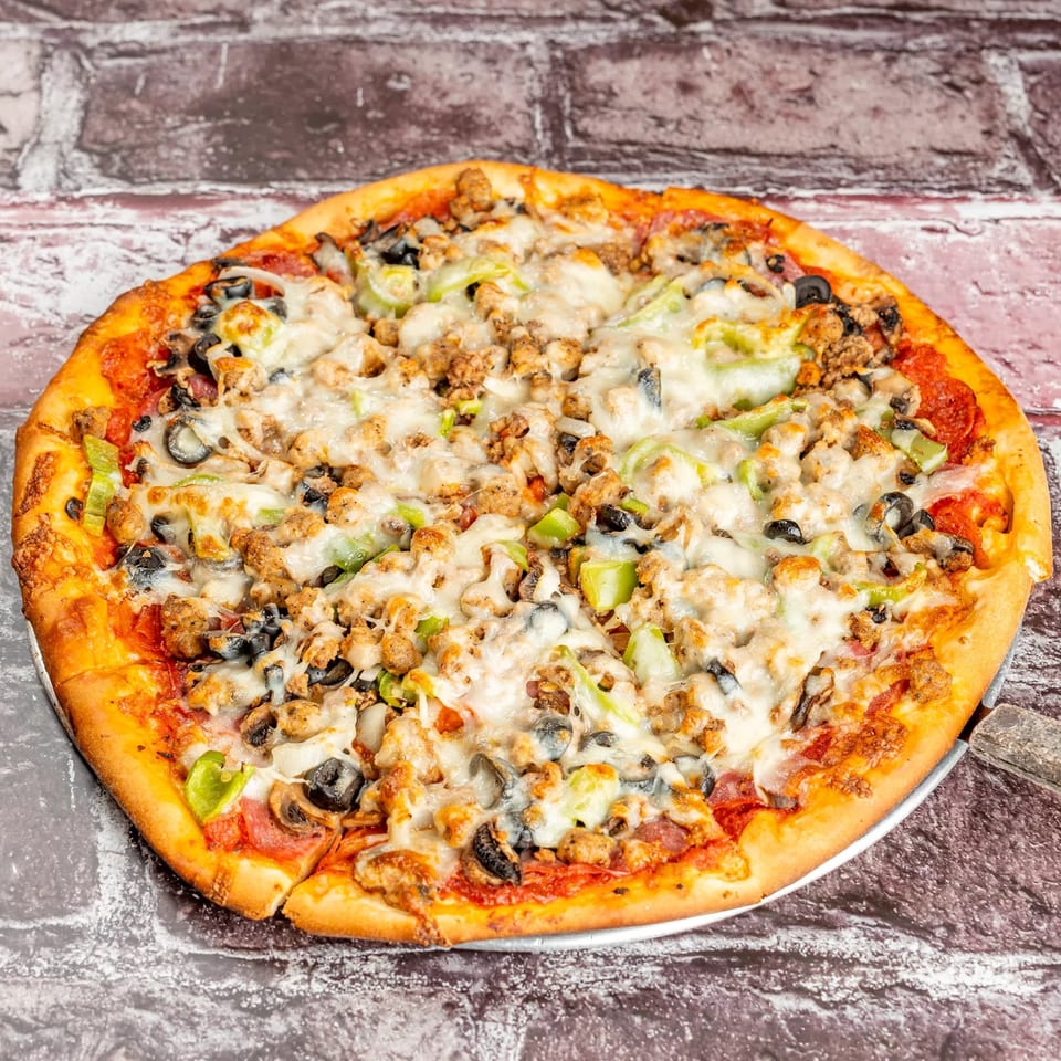 Marri's Pizza & Pasta's supreme pizza with pepperoni, sausage, olives, and green peppers.
